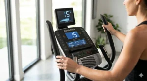 Close-up of an elliptical console screen displaying a 15-degree incline level setting.