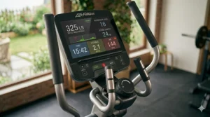 Close-up of the digital console on a 325 pound elliptical trainer showing fitness metrics.