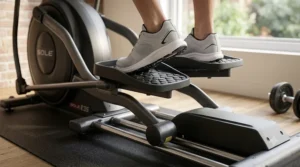 Large, textured anti-slip pedals designed for stability on a 400 pound elliptical machine.
