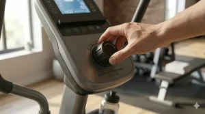 Adjustable resistance dial on a 275 pound elliptical machine console.