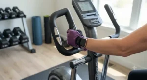 Ergonomic handlebars on a small elliptical machine suited for people of short stature.