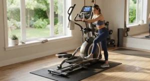 Athlete preparing for a workout next to a sturdy low-impact elliptical machine.