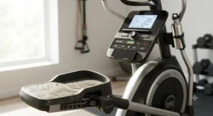 Close-up of adjustable pedals and digital console on an elliptical for multi-user family home workouts.
