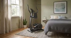 A stylish compact elliptical machine that complements modern small bedroom decor.
