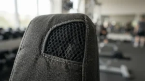 Airflow vents on a waterproof vs dust cover for home gym equipment designed for humid climates.